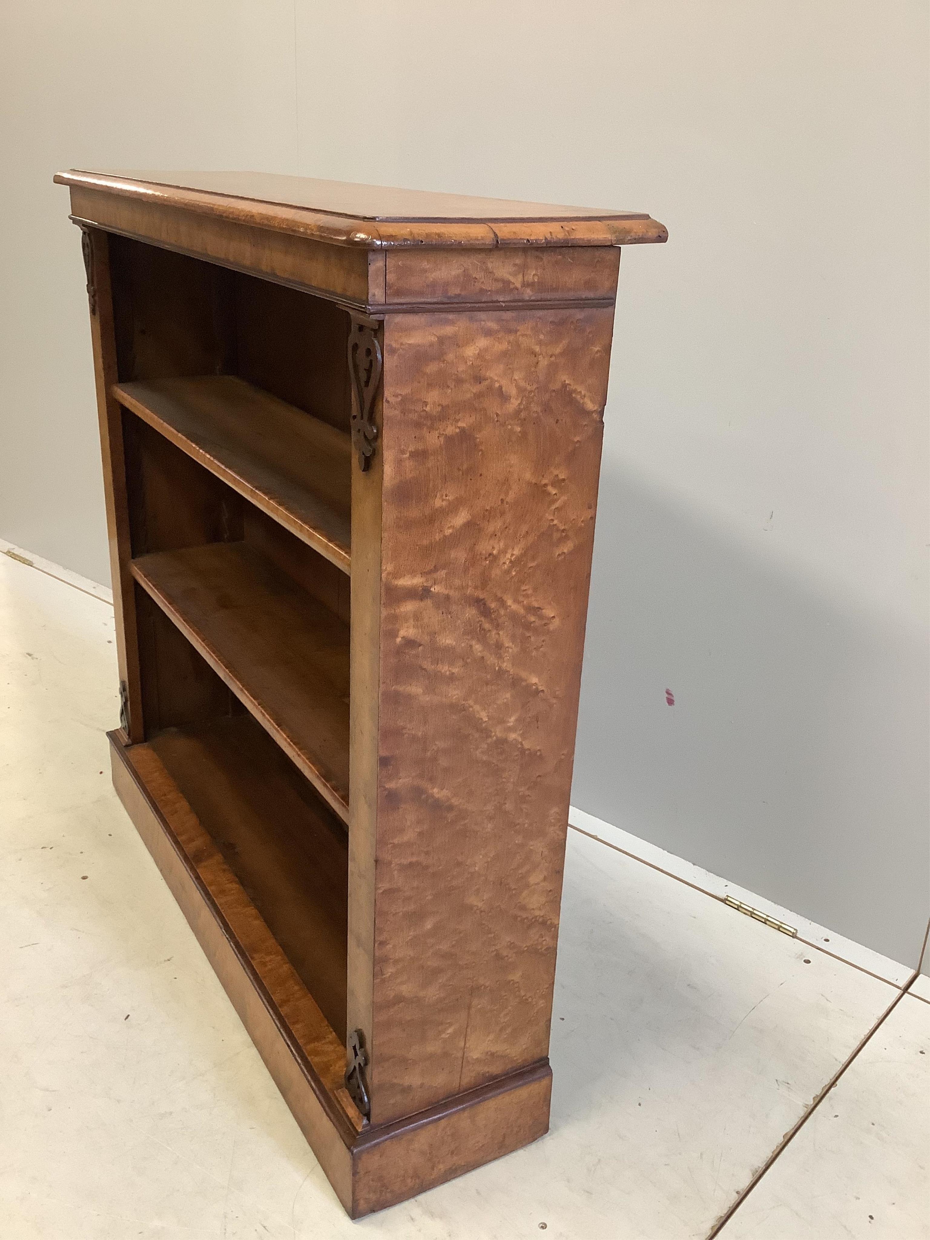 A Victorian bird's eye maple open bookcase, width 95cm, depth 27cm, height 94cm. Condition - good